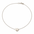 A silver chain necklace with a small, polished silver heart pendant