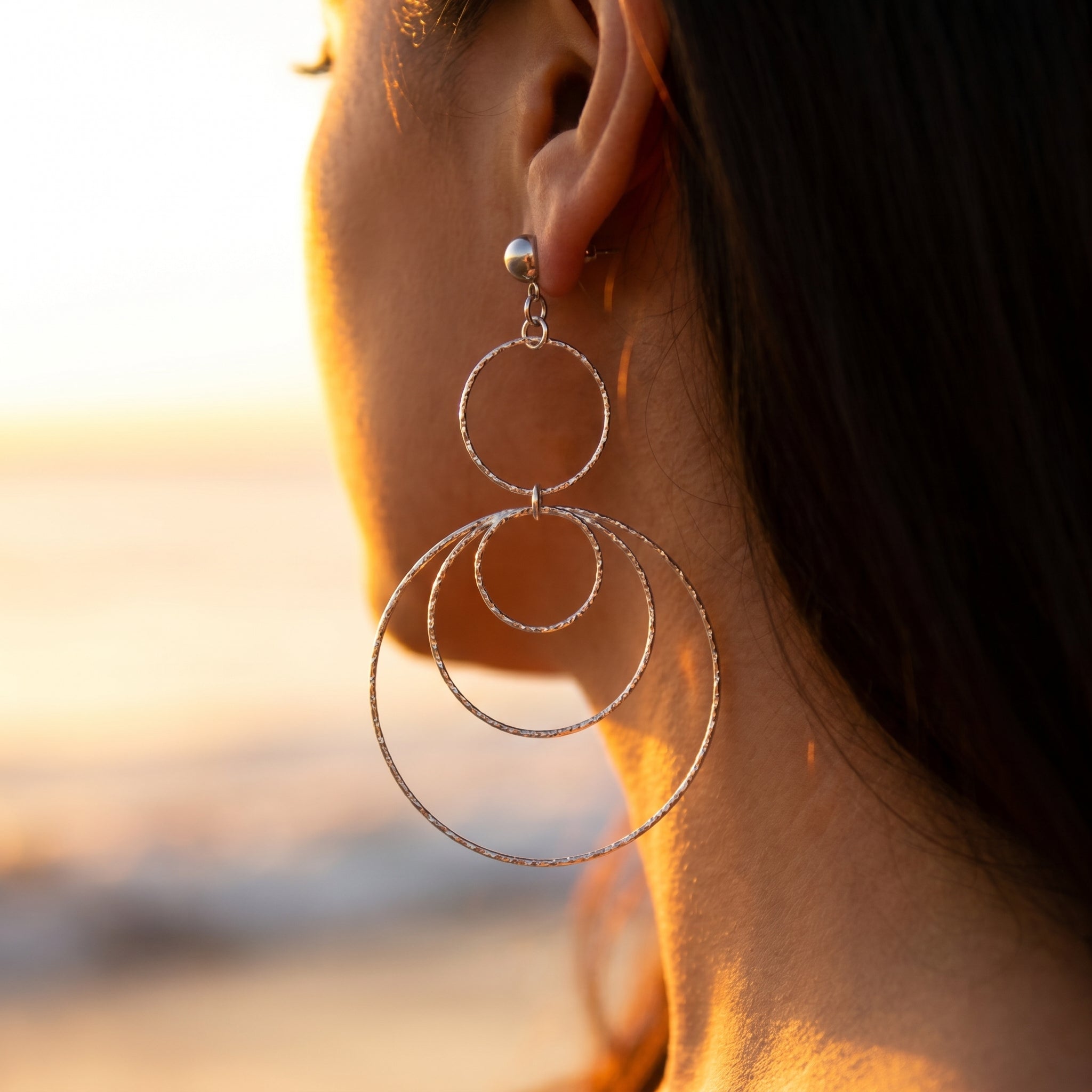 The Infinity Twist Hoop Earrings