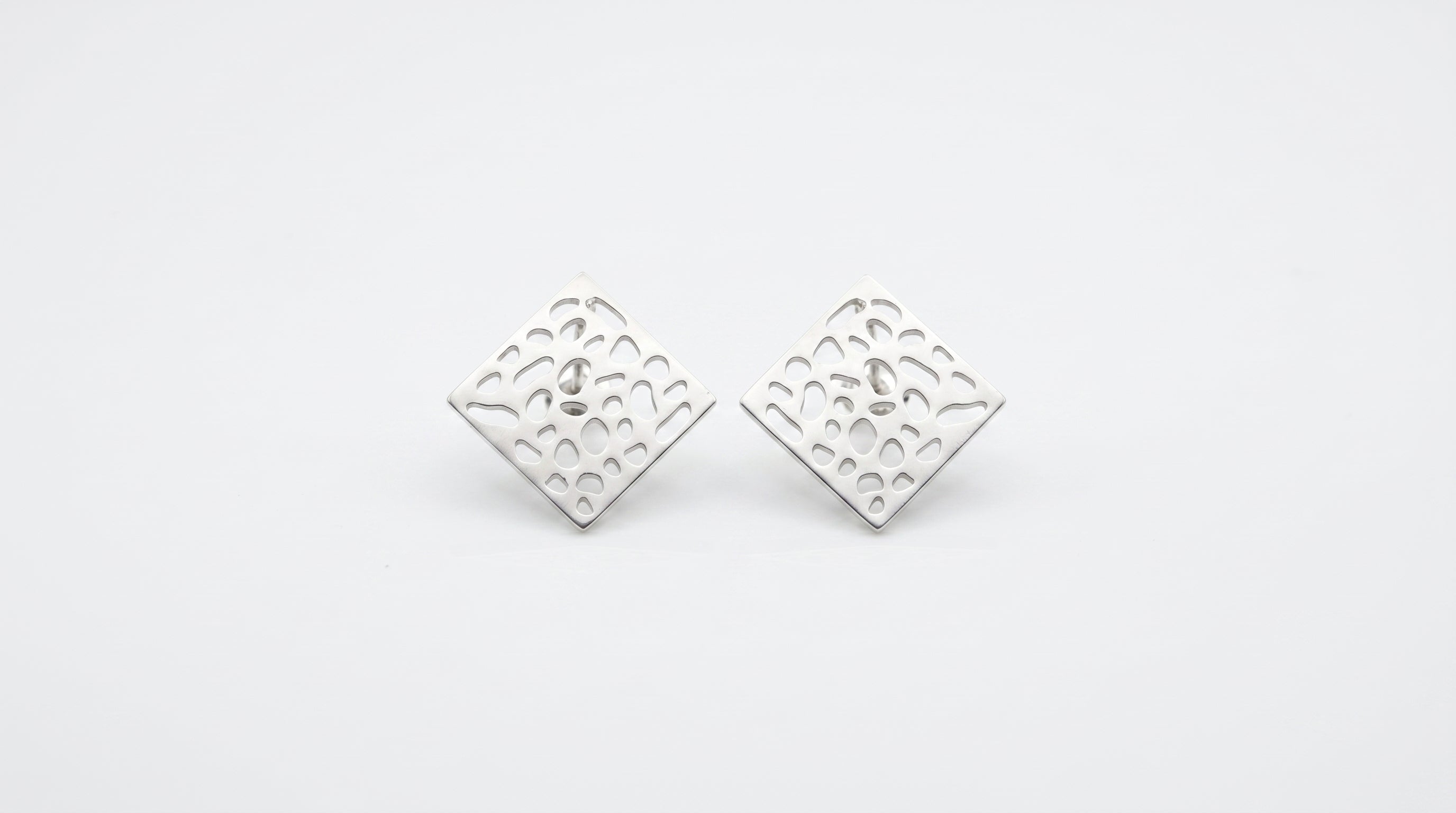 The Matte Silver Geometric statement Earrings