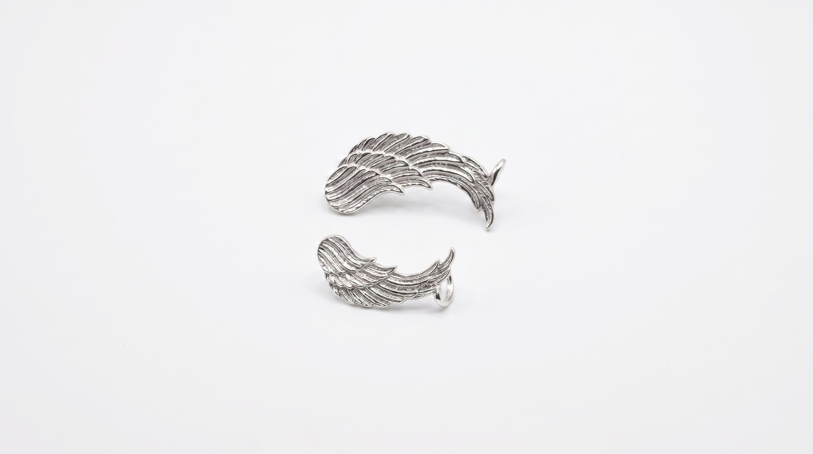 Curved Wing Statement Ear Crawlers