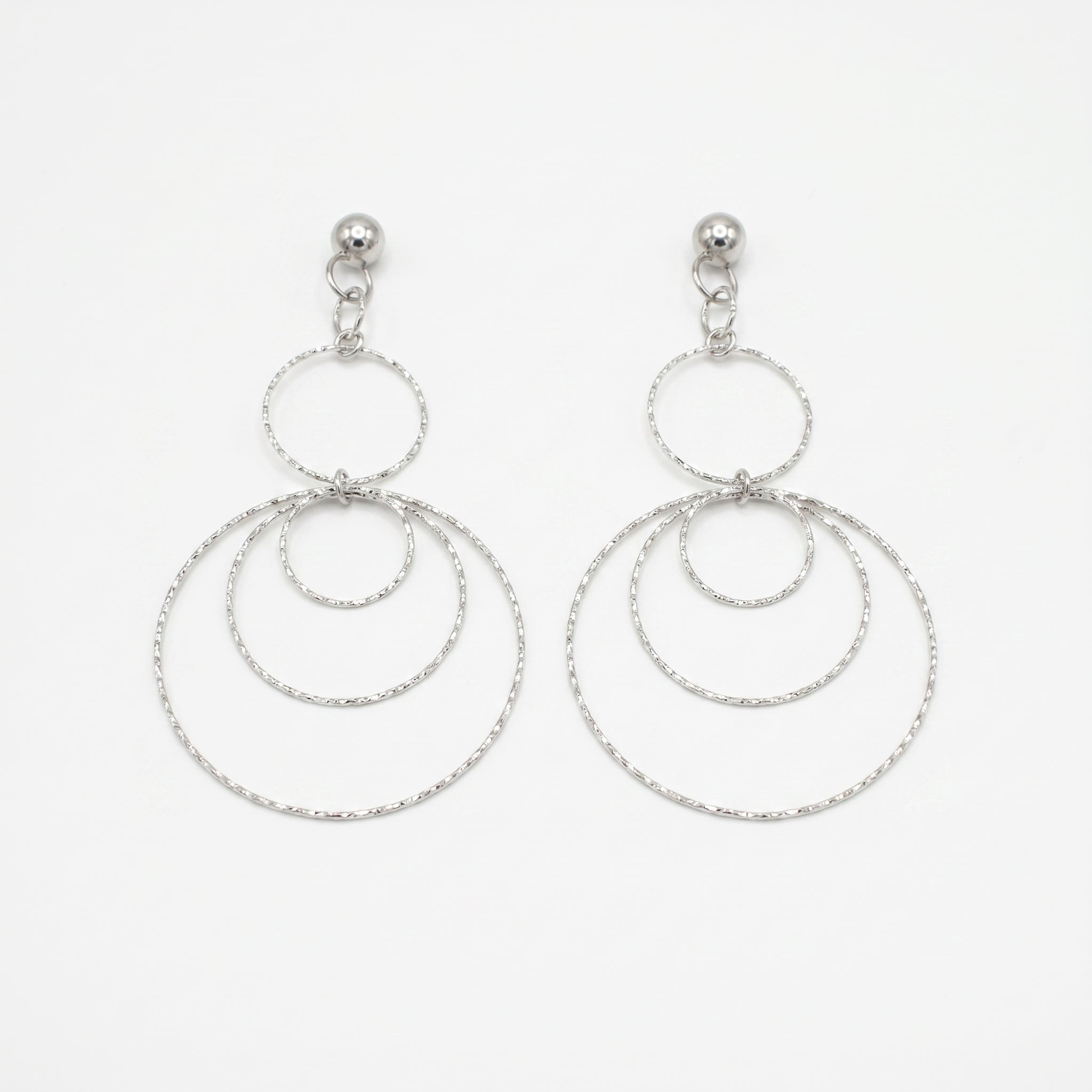 The Infinity Twist Hoop Earrings